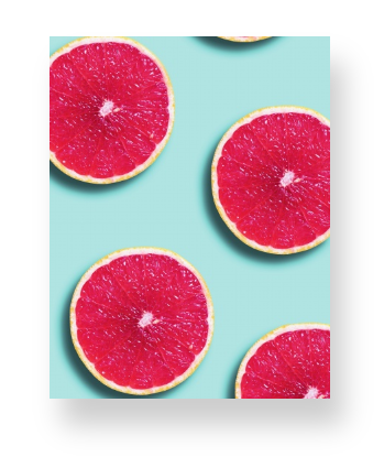 Grapefruit on Blue Notebook